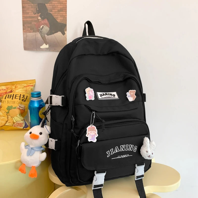 Cute Cartoon School Backpack for Girls Large Capacity with Plush Decorations Ideal for Daily Use