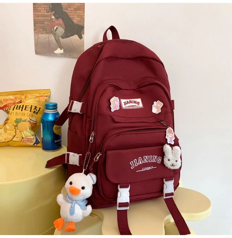 Cute Cartoon School Backpack for Girls Large Capacity with Plush Decorations Ideal for Daily Use