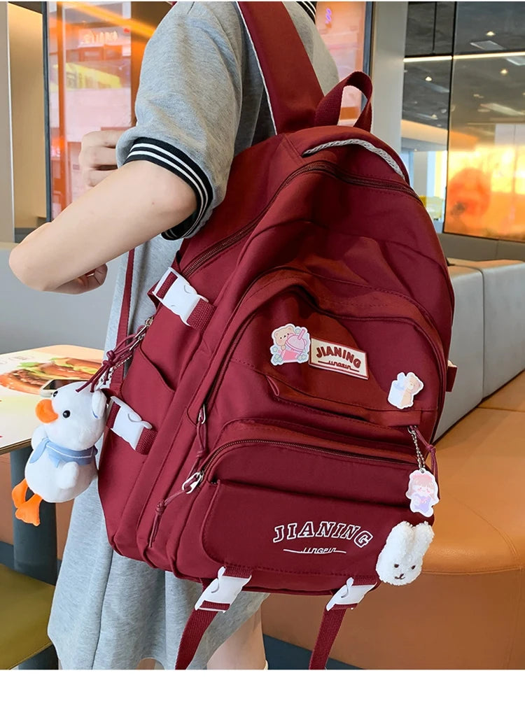 Cute Cartoon School Backpack for Girls Large Capacity with Plush Decorations Ideal for Daily Use
