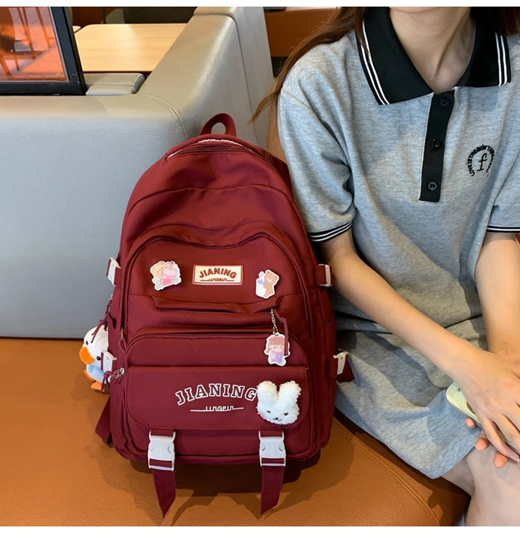 Cute Cartoon School Backpack for Girls Large Capacity with Plush Decorations Ideal for Daily Use