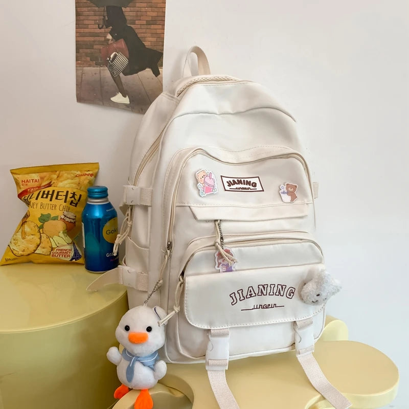 Cute Cartoon School Backpack for Girls Large Capacity with Plush Decorations Ideal for Daily Use