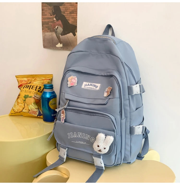 Cute Cartoon School Backpack for Girls Large Capacity with Plush Decorations Ideal for Daily Use