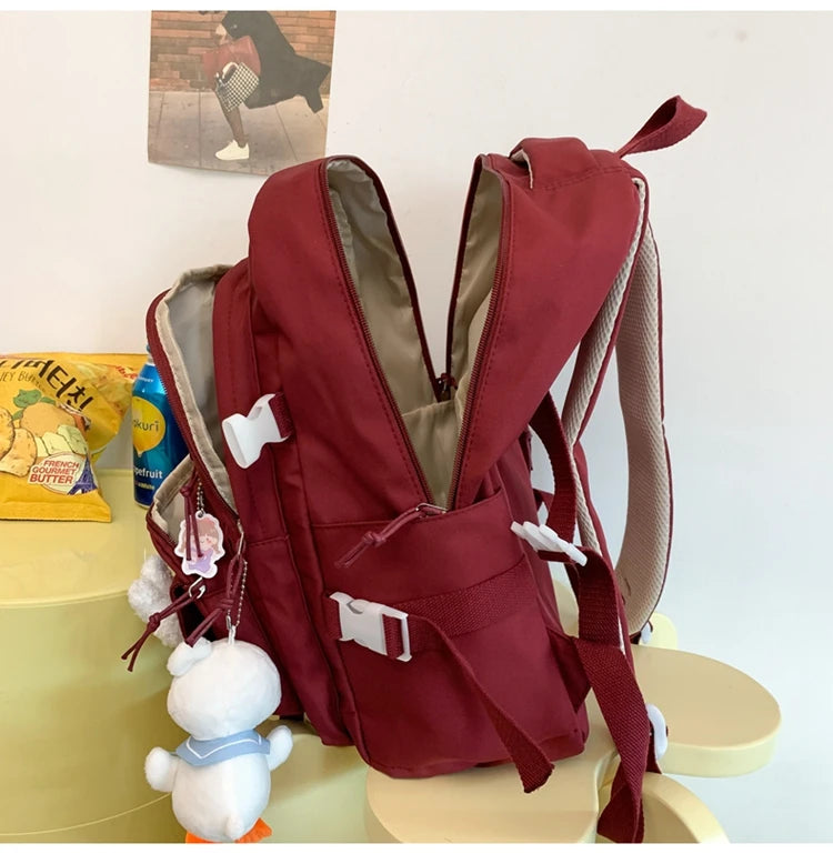 Cute Cartoon School Backpack for Girls Large Capacity with Plush Decorations Ideal for Daily Use