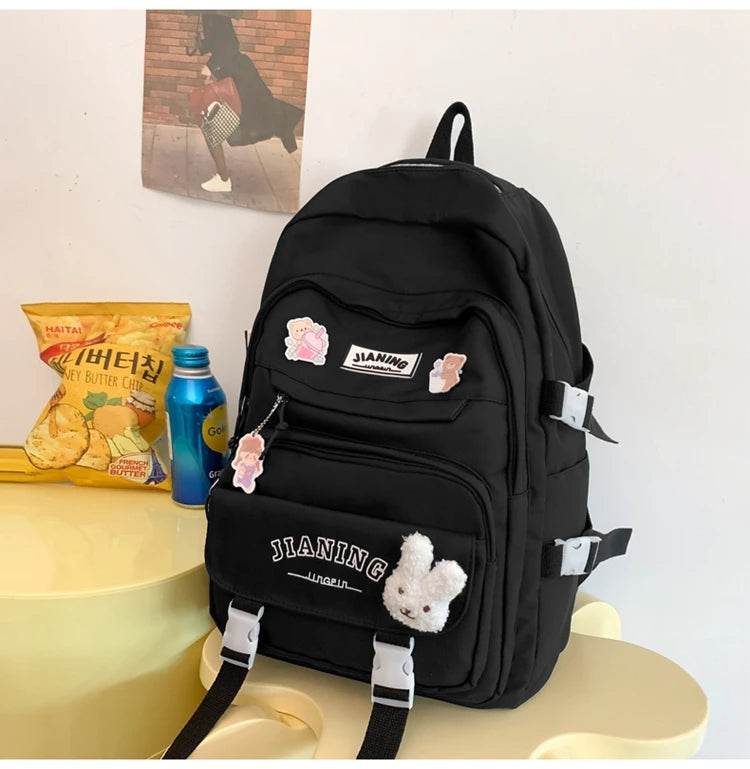 Cute Cartoon School Backpack for Girls Large Capacity with Plush Decorations Ideal for Daily Use