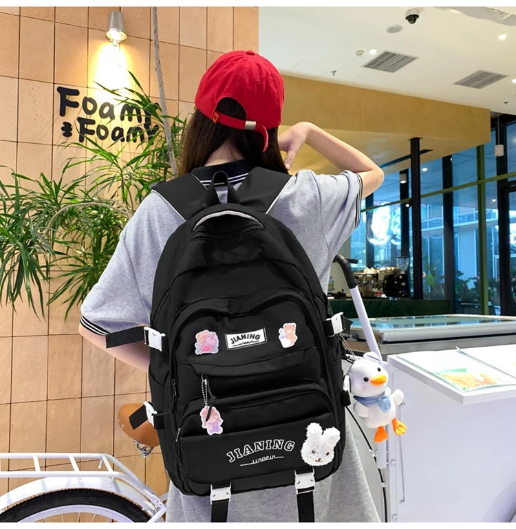 Cute Cartoon School Backpack for Girls Large Capacity with Plush Decorations Ideal for Daily Use