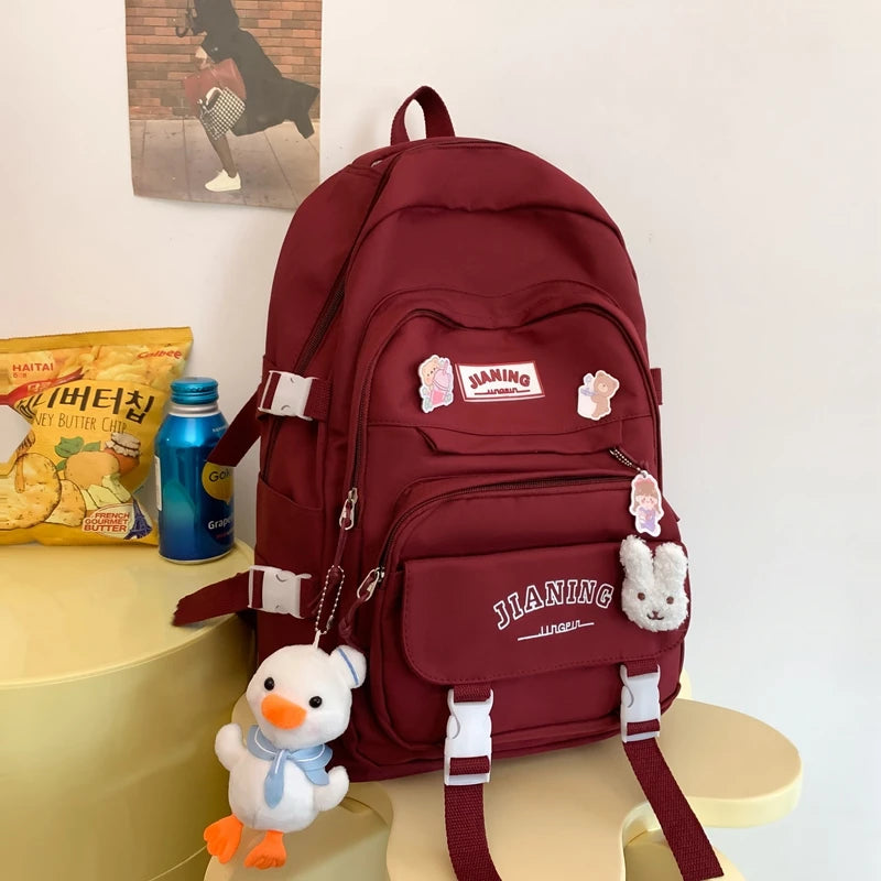 Cute Cartoon School Backpack for Girls Large Capacity with Plush Decorations Ideal for Daily Use